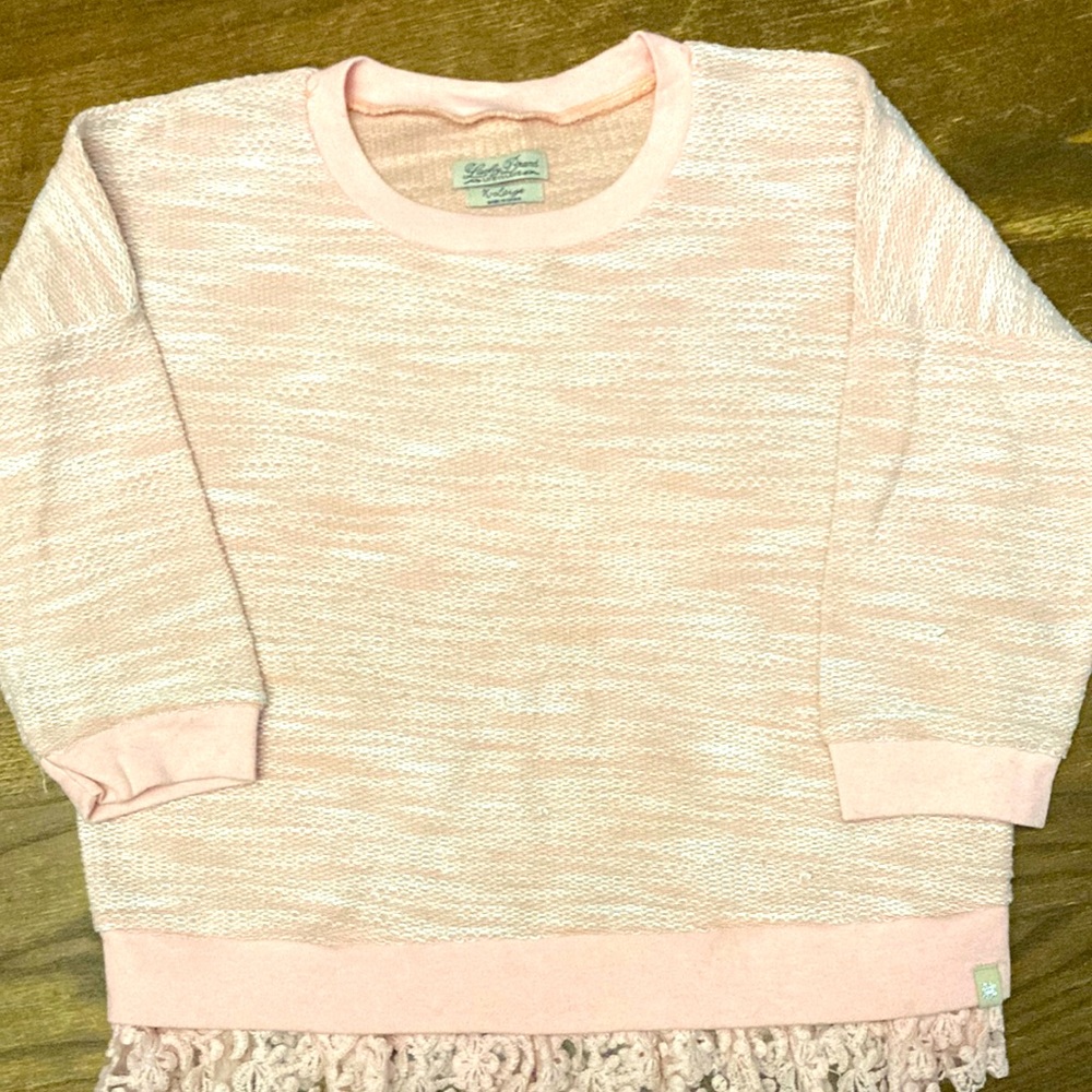 Girls pink lucky top. Lace detail on bottom, no rips or tears.